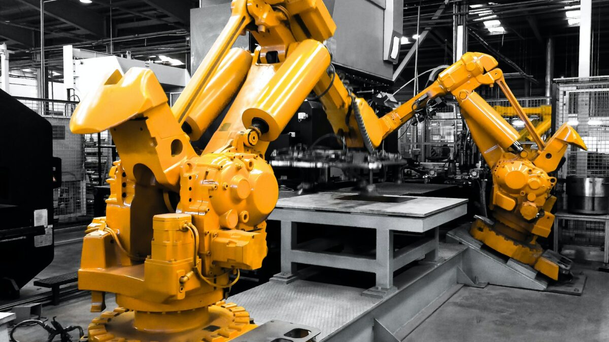 Industrial robots in production line manufacturer factory