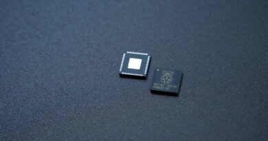 a couple of microchips sitting on top of a table
