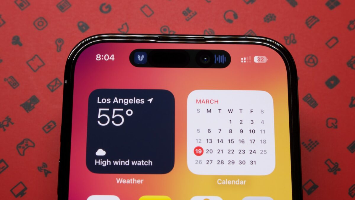 a close up of a cell phone with a calendar on the screen