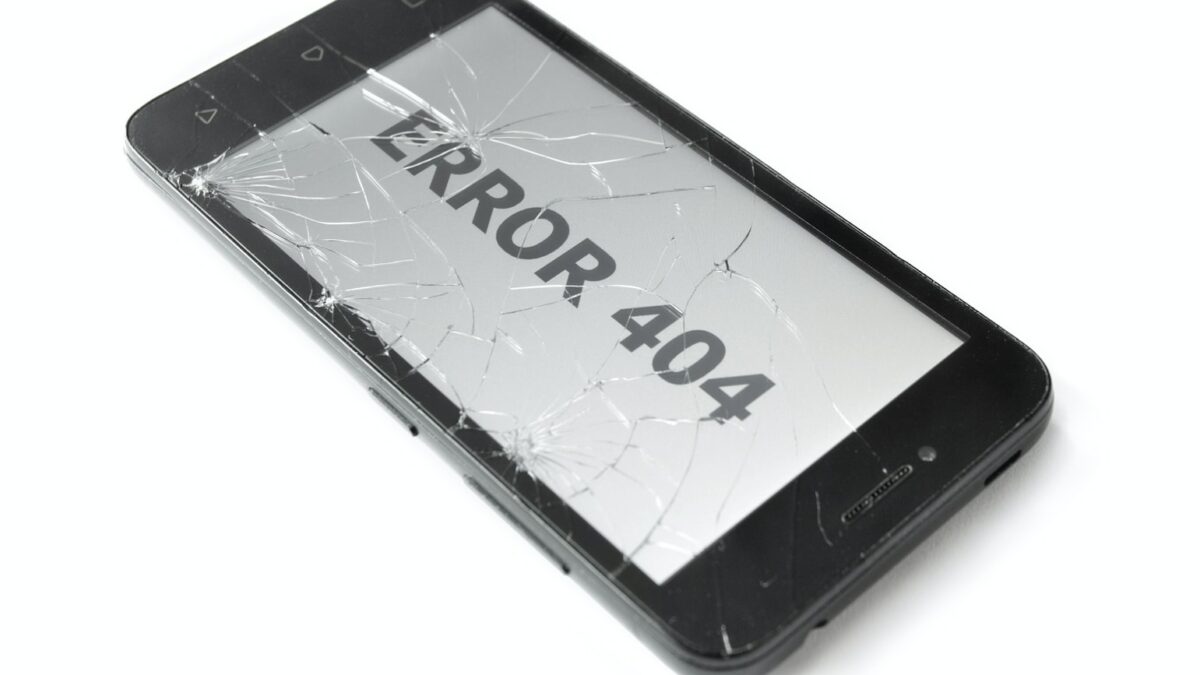 a broken cell phone with the word error on it