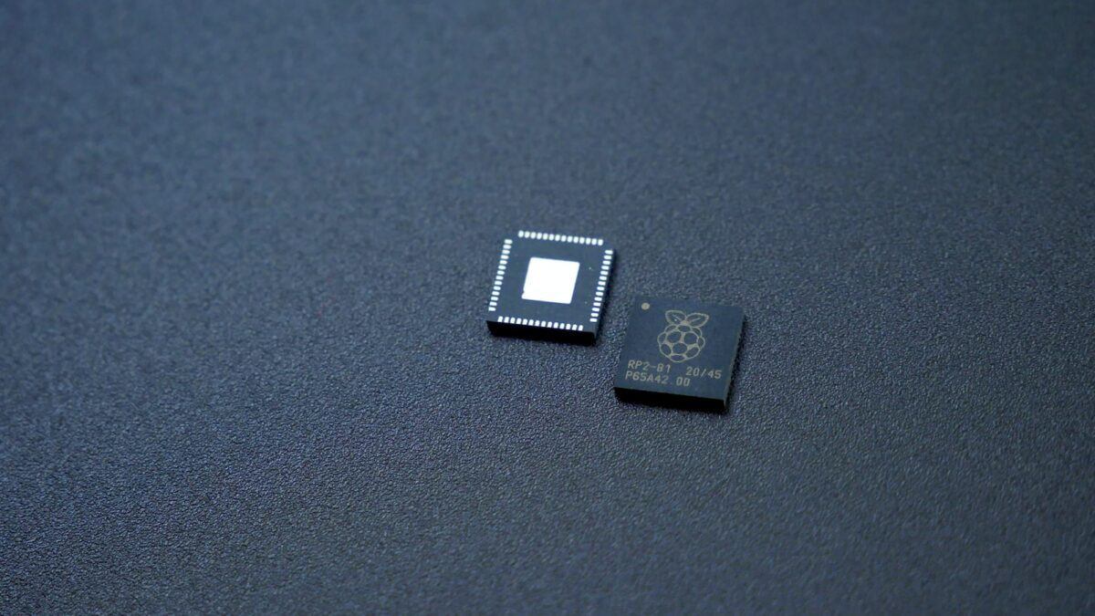 a couple of microchips sitting on top of a table