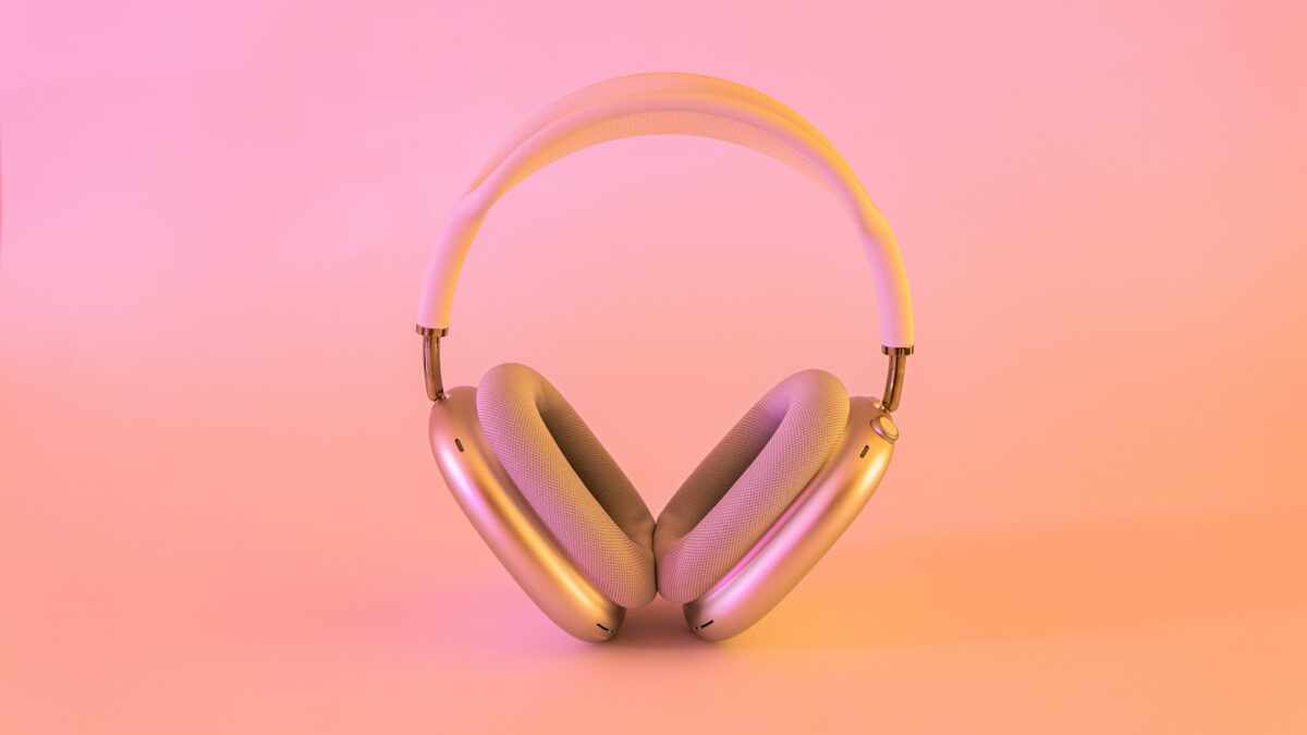 pink and white wireless headphones