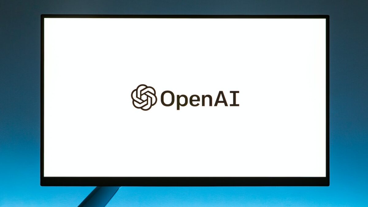 a computer screen with the open ai logo on it