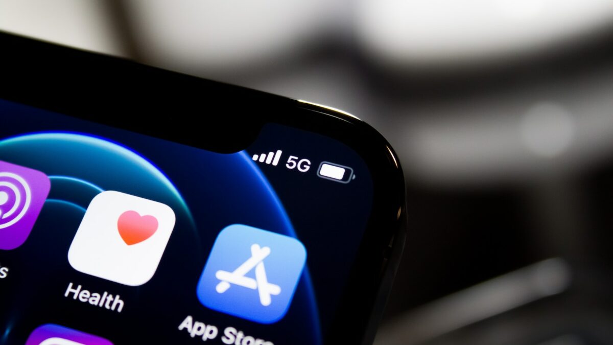 black iphone 4 displaying icons