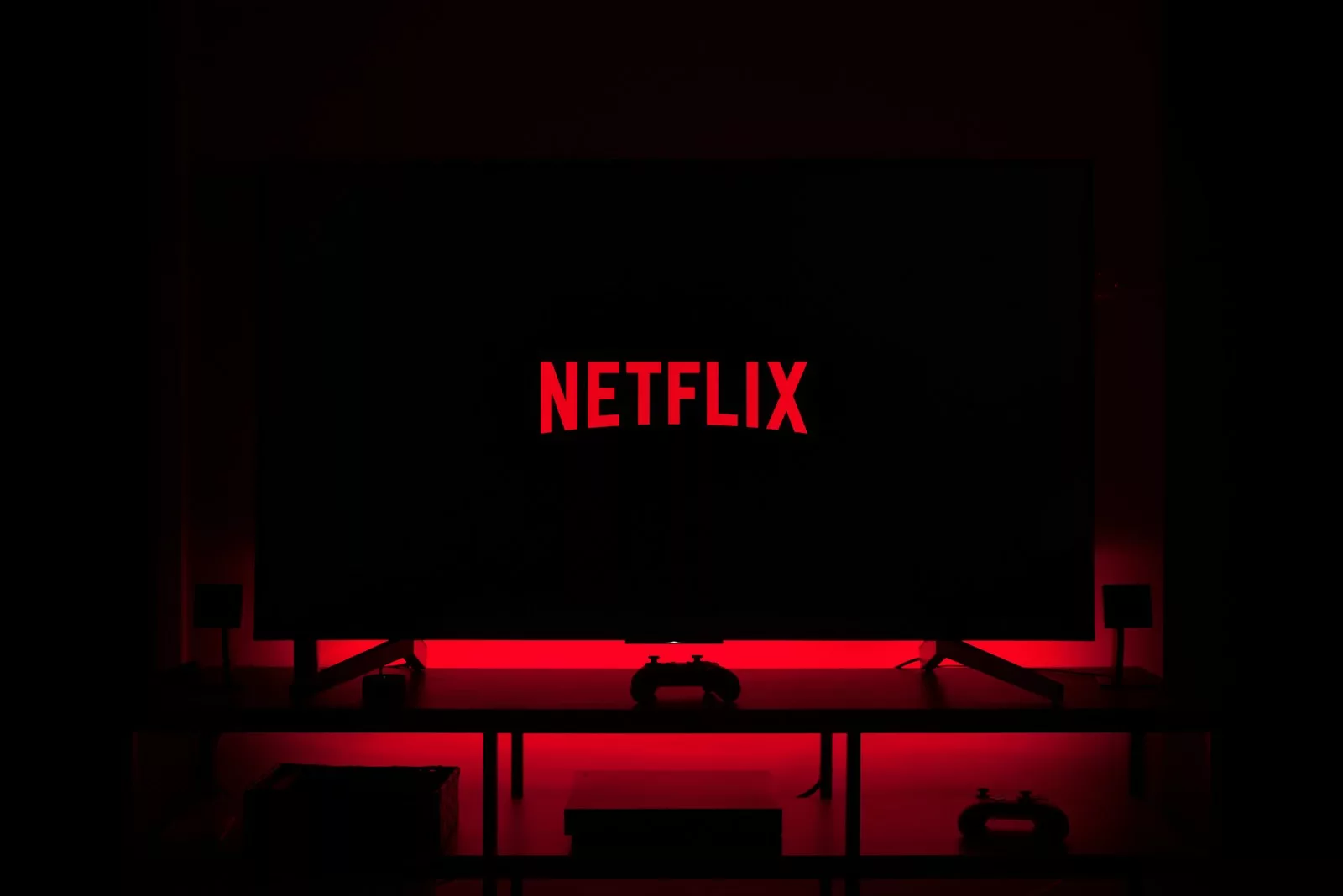 flat screen television displaying Netflix logo