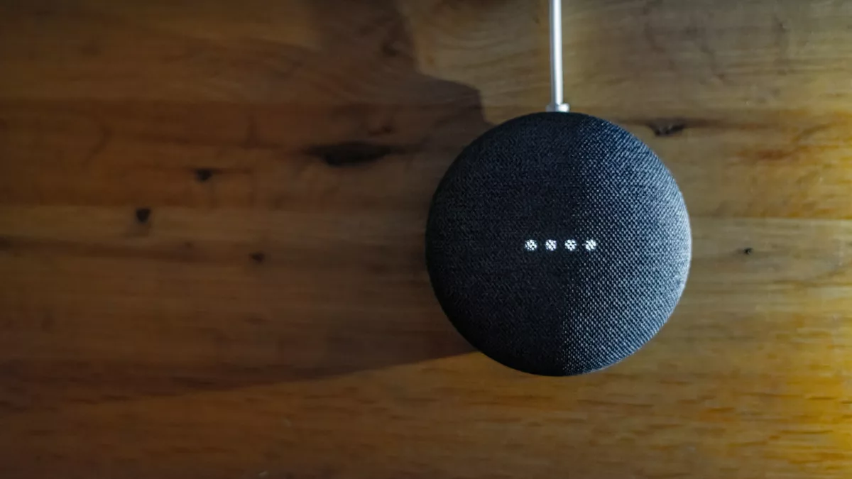 a blue ball on a wooden surface