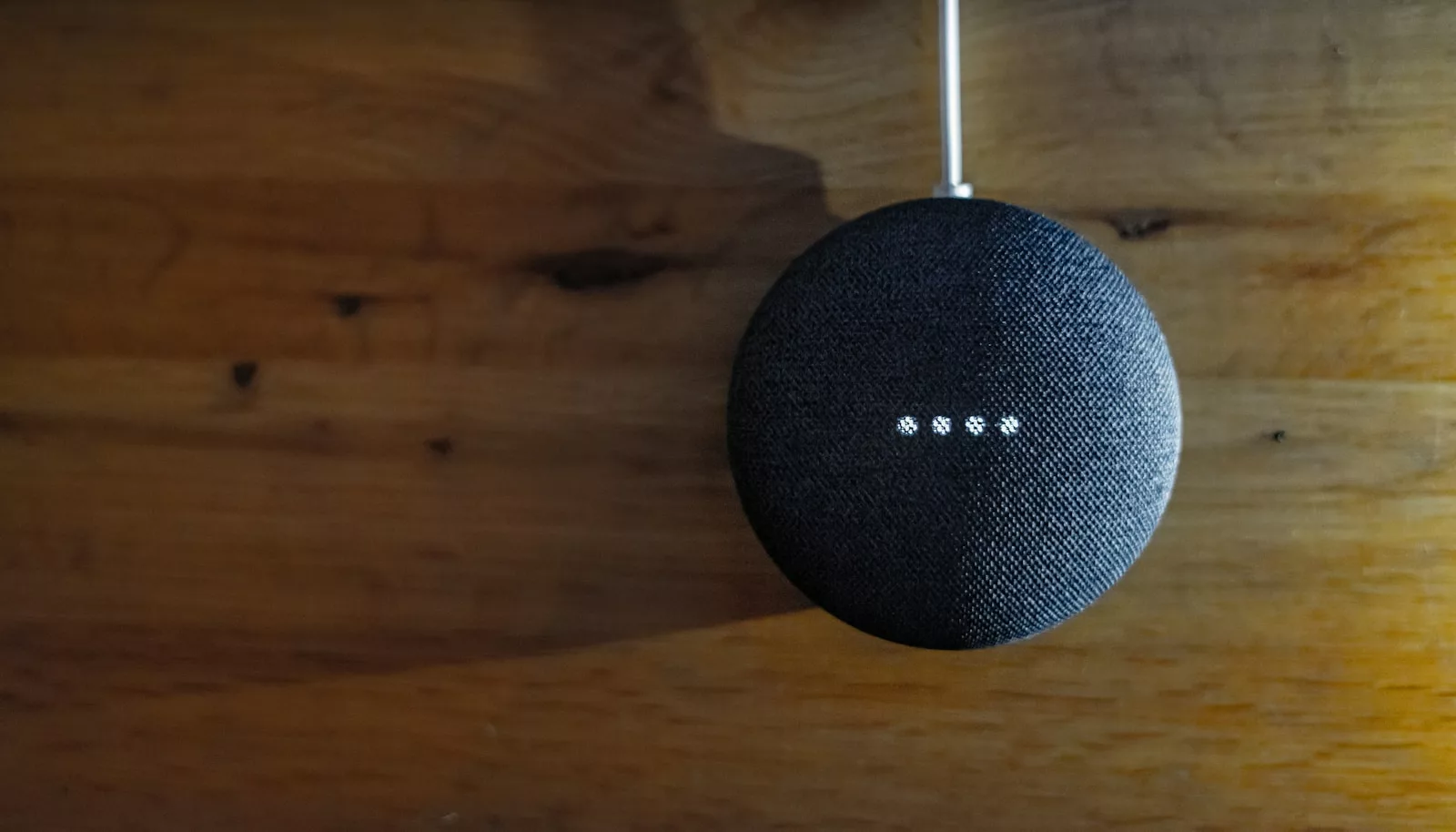 a blue ball on a wooden surface