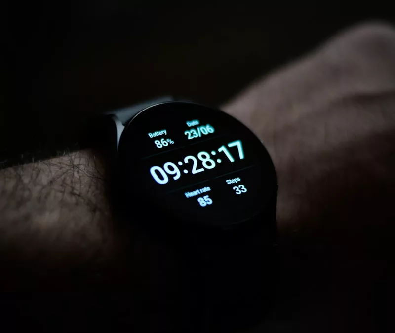 a close up of a person's wrist with a watch on it