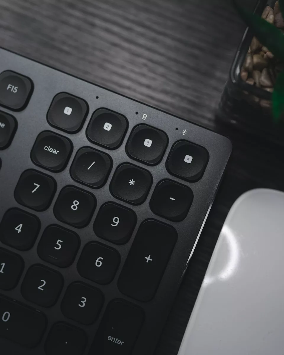 a close up of a keyboard and a mouse
