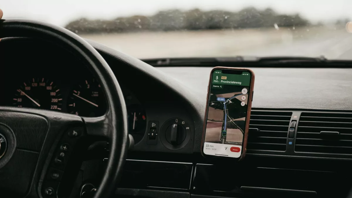 smartphone turned-on in vehicle mount inside vehicle